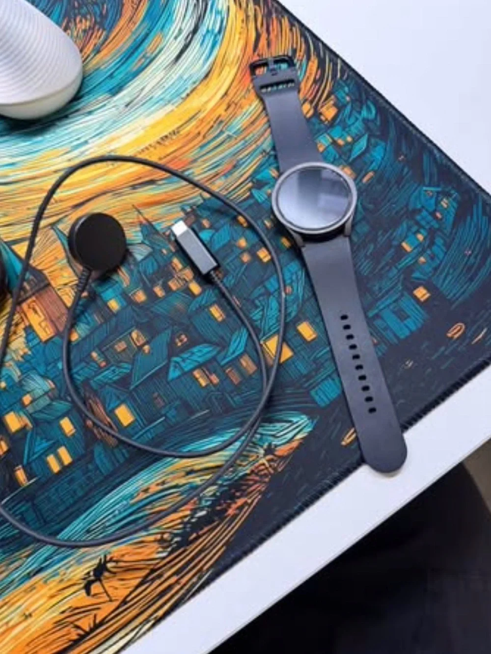 Samsung Galaxy Watch 6 in Graphite with Pink Dial Accents